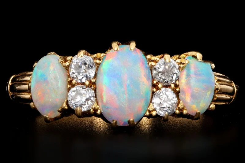 Victorian 18k yellow gold opal and diamond ring